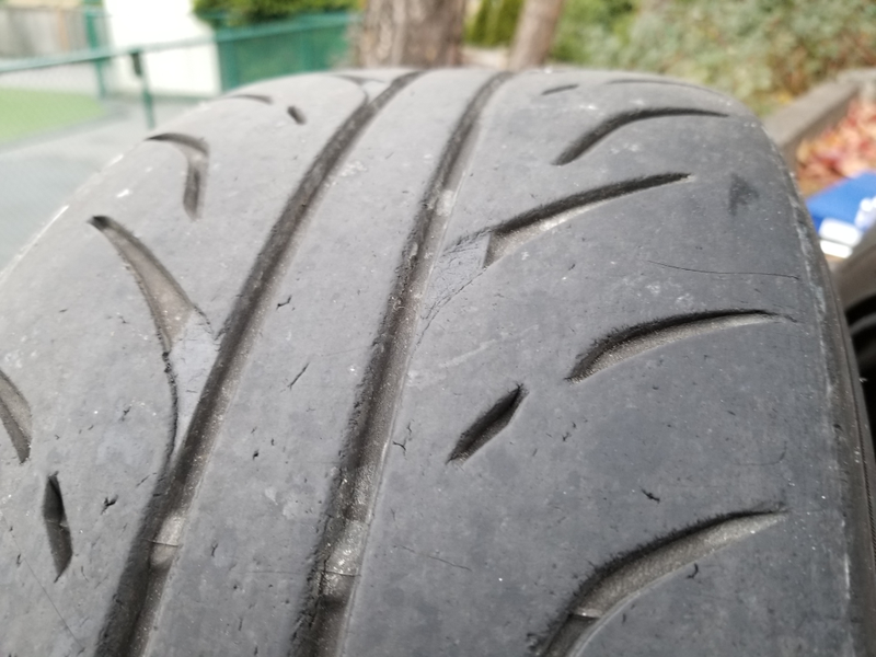 This is the drivers side front tire after ≈75,000 miles through all imaginable conditions. Thrashed, but still some life left.